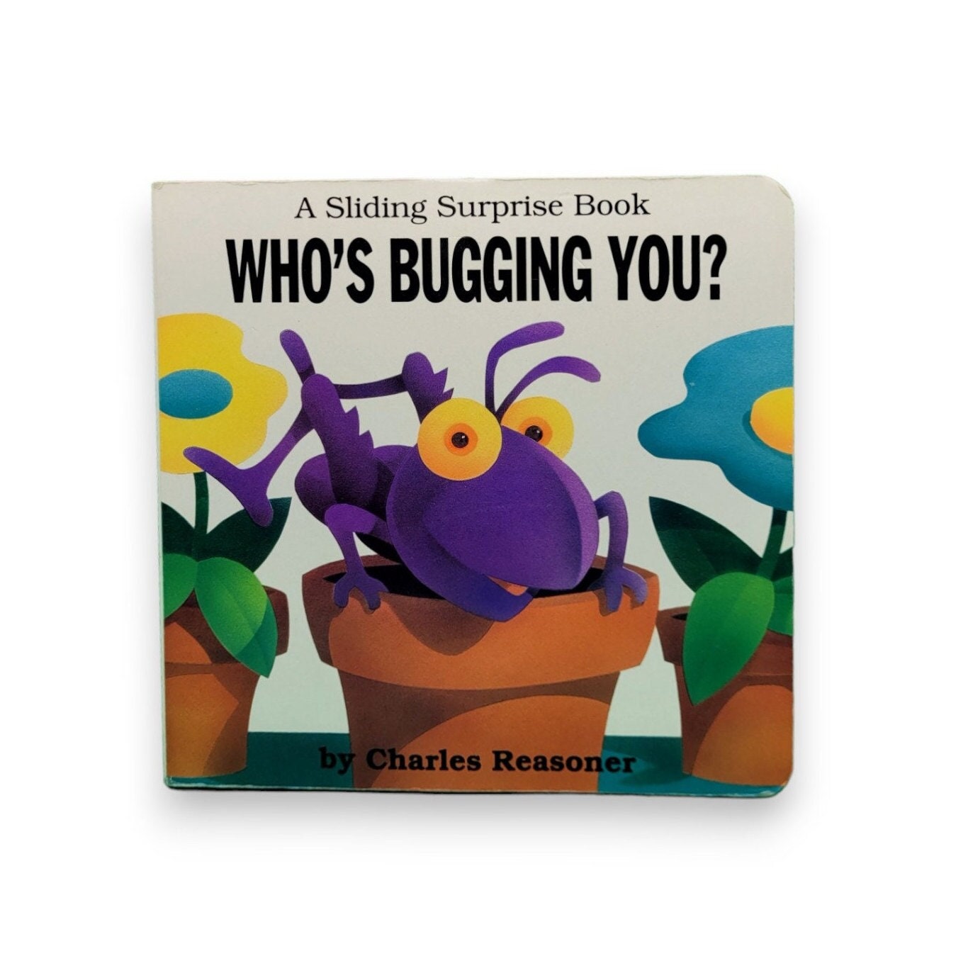 Who's Bugging You? (A Sliding Surprise Book) by Charles Reasoner 1997